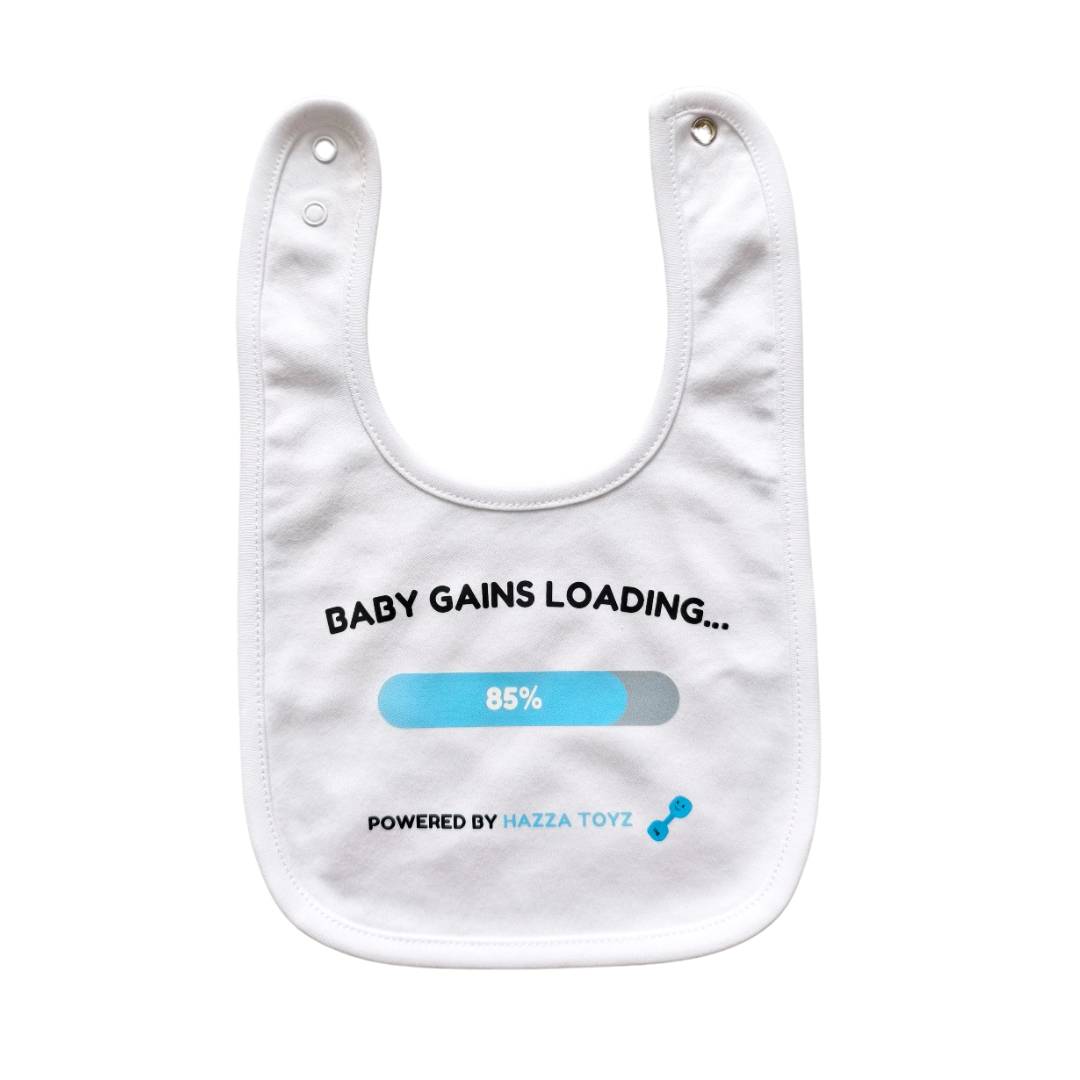 White Baby Gains Loading bib with 85% progress bar and dumbbell graphic from Hazza Toyz