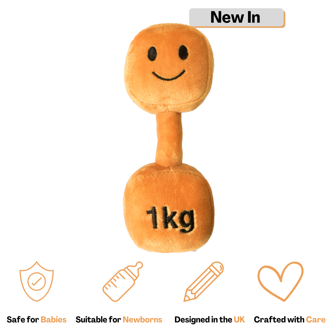 Hazza Toyz apricot orange plush dumbbell for babies, perfect for sensory play and motor skills development.