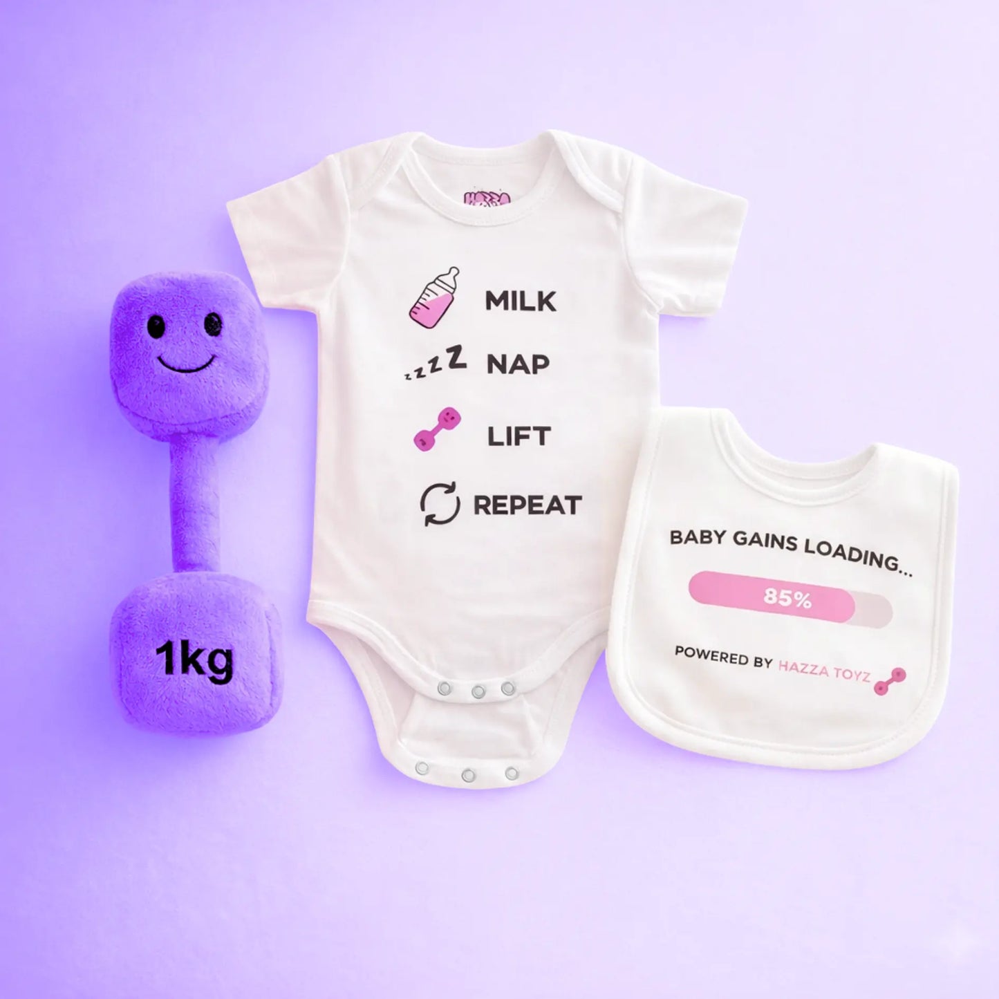 Lil Lifter Starter Set featuring Lavender Purple plush 1kg dumbbell, Milk Nap Lift Repeat bodysuit and Baby Gains Loading bib