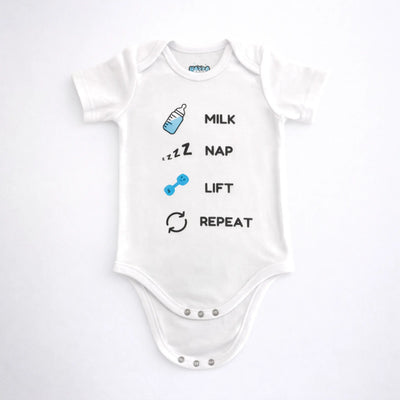 White and blue baby bodysuit with milk nap lift repeat text and blue bottle and dumbbell icons displayed on a white background