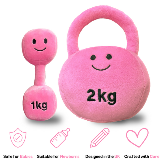 Candy Chateau pink plush baby toy set – includes 1kg dumbbell and 2kg kettlebell with smiling faces, soft and safe for newborns and toddlers.
