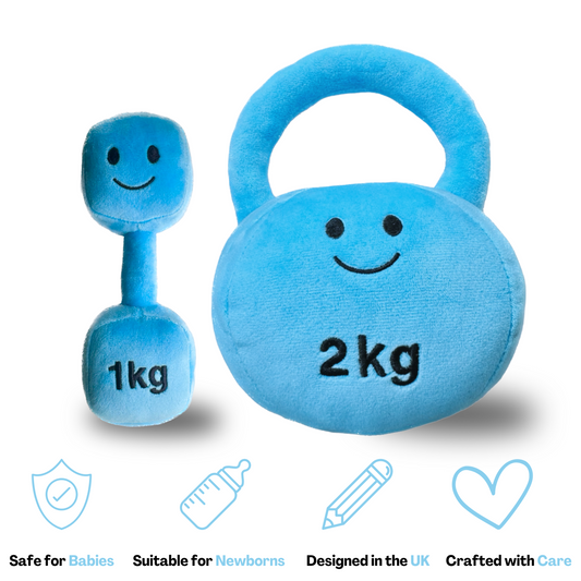 Blue plush baby dumbbell toy labeled “1kg” and plush baby kettlebell toy labeled “2kg” with smiling faces, shown as safe, newborn-friendly, UK designed, and crafted with care.
